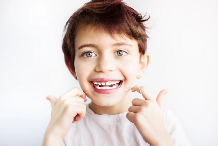 When Should My Kids Start Flossing Their Teeth?